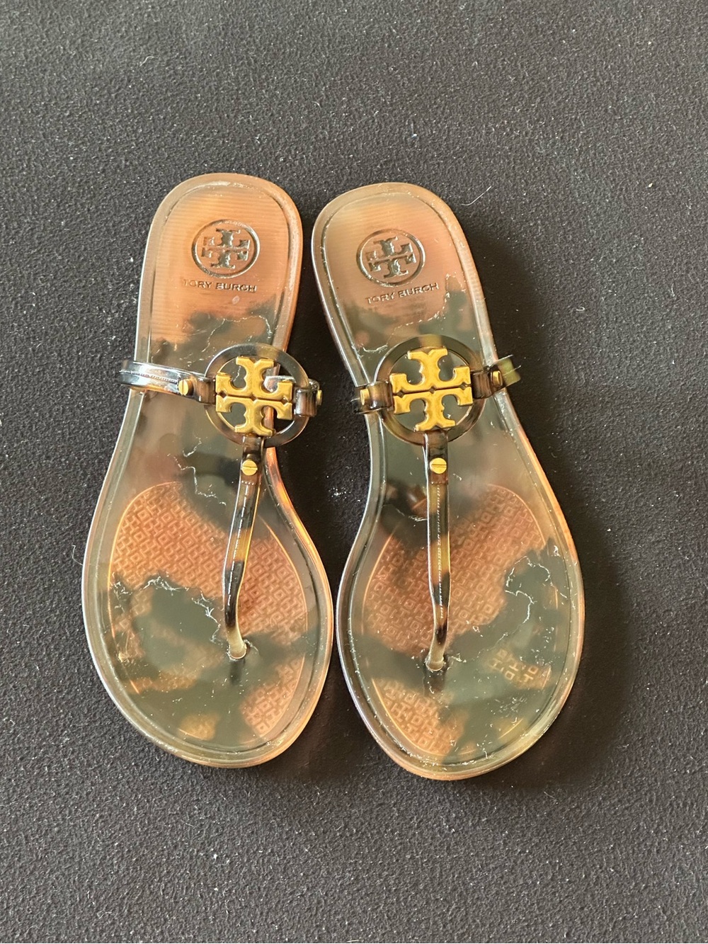 Tory Burch Jelly Thong Sandals in tortoiseshell.